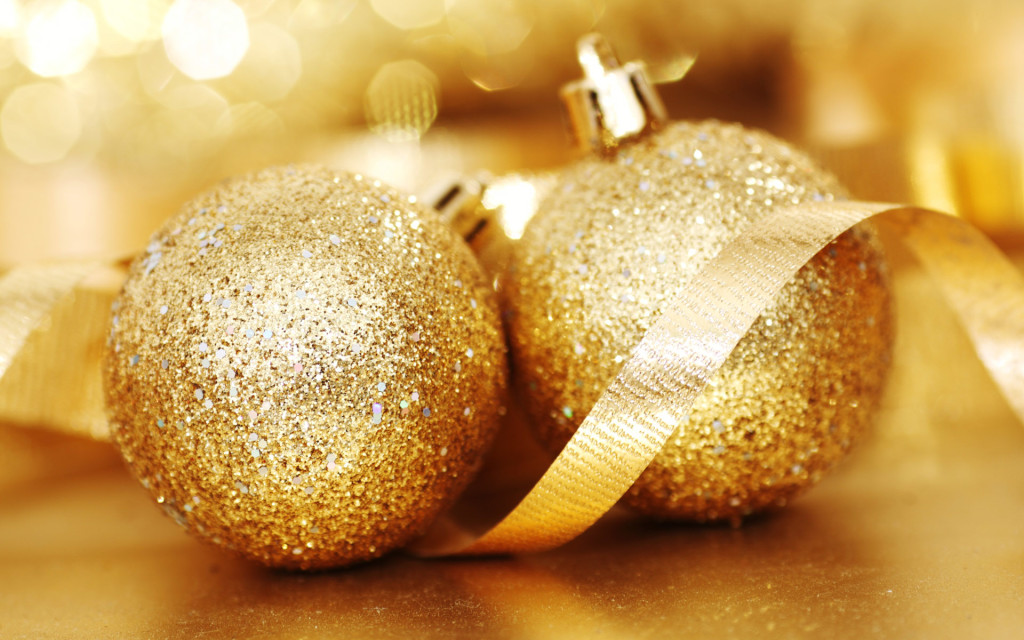 golden christmas ball on golden bokeh background